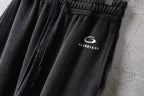 Black pants detail with Balenciaga logo and drawstring cords