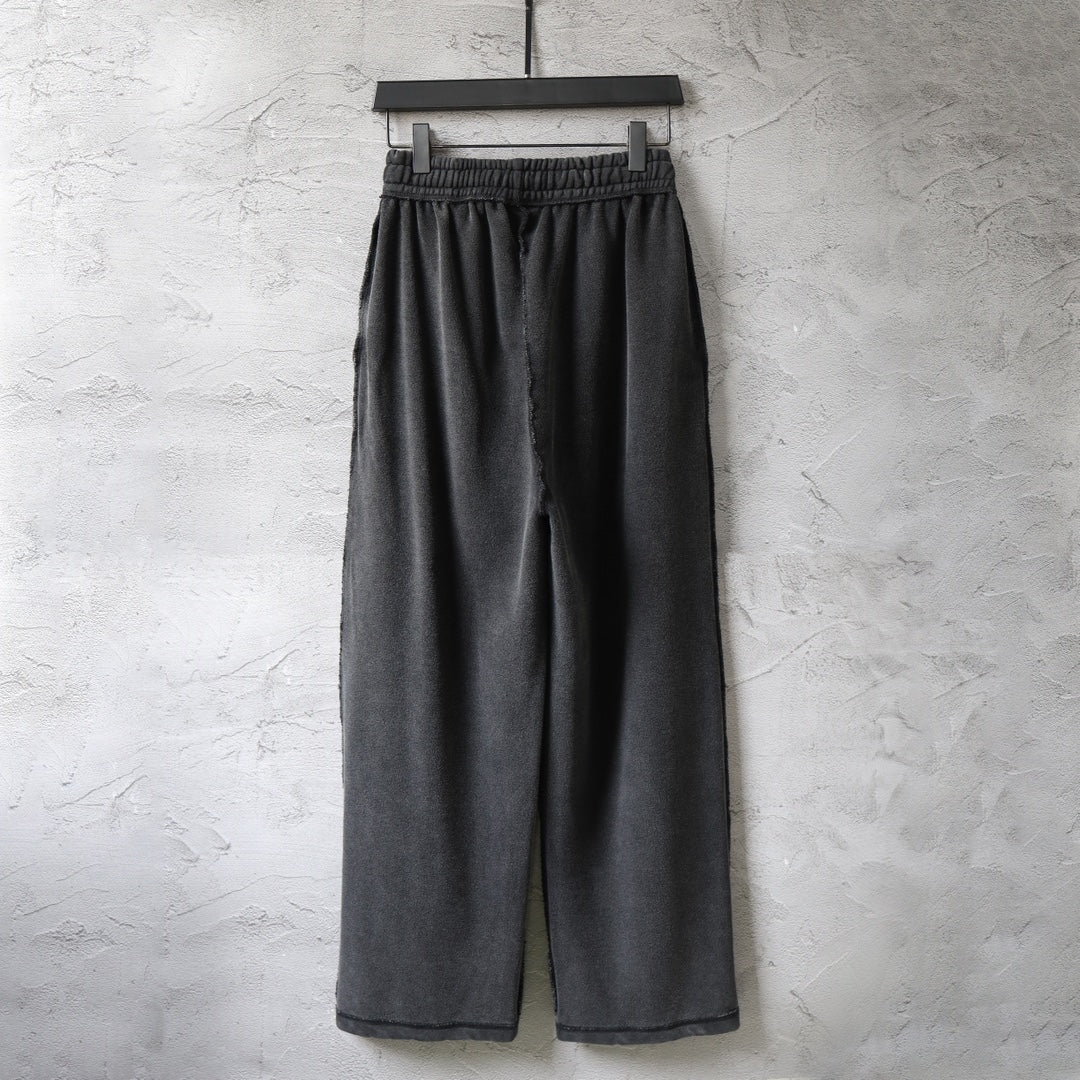 Balenciaga dark wide-leg pants with elastic waistband