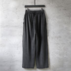 Dark wide-leg pants with elastic waistband and drawstring
