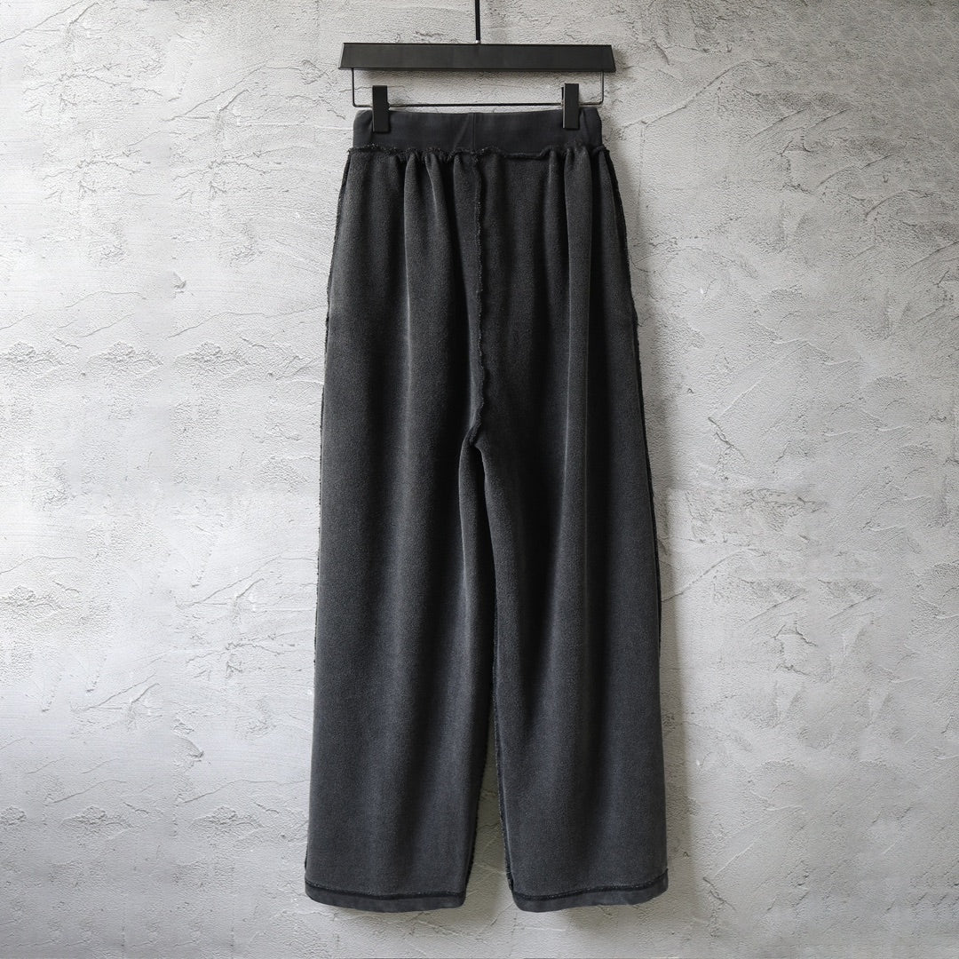 Balenciaga black wide-leg pants, gathered waist and relaxed straight legs