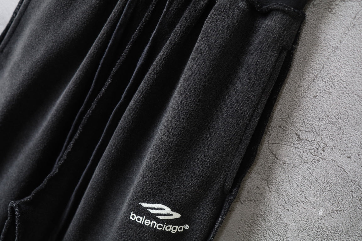 Balenciaga pants logo on side of gathered fabric