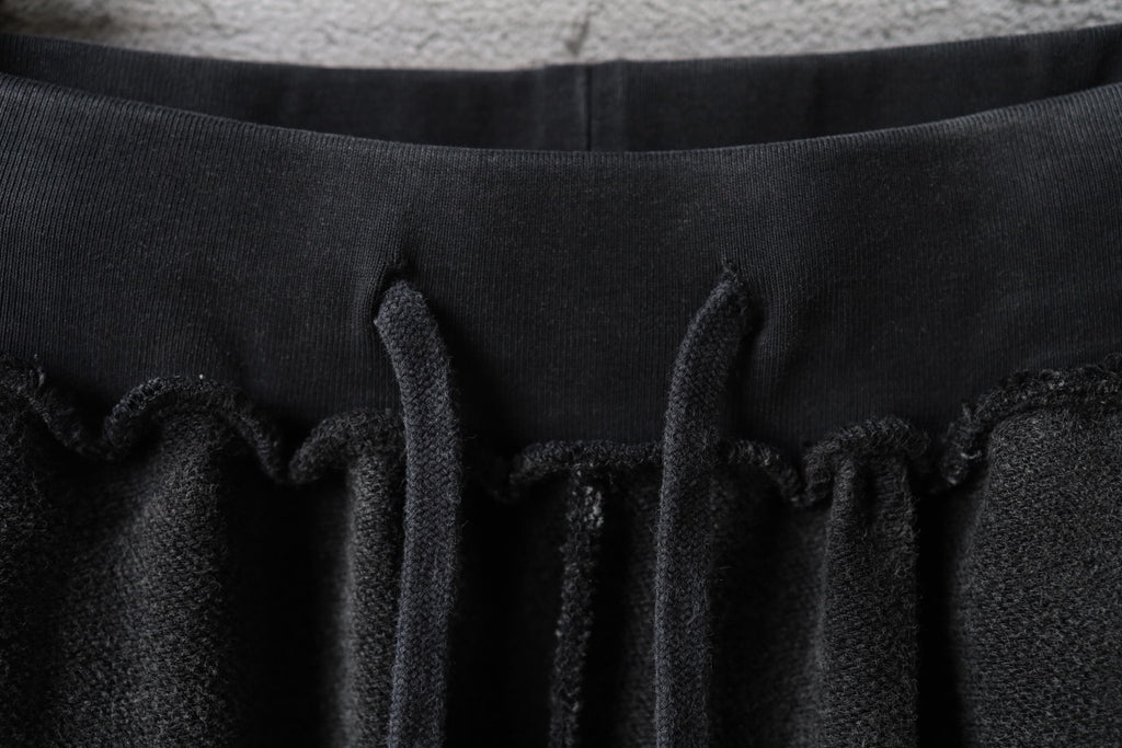 Balenciaga black drawstring waistband with gathered fabric detail.