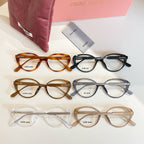 MiuMiu eyeglasses assortment with full-rim frames in amber, black, and clear