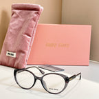 MiuMiu eyeglasses with dark full-rim frames and curved temple detailing