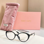 MiuMiu eyeglasses with black full-rim frames and “miu miu” logo on lens
