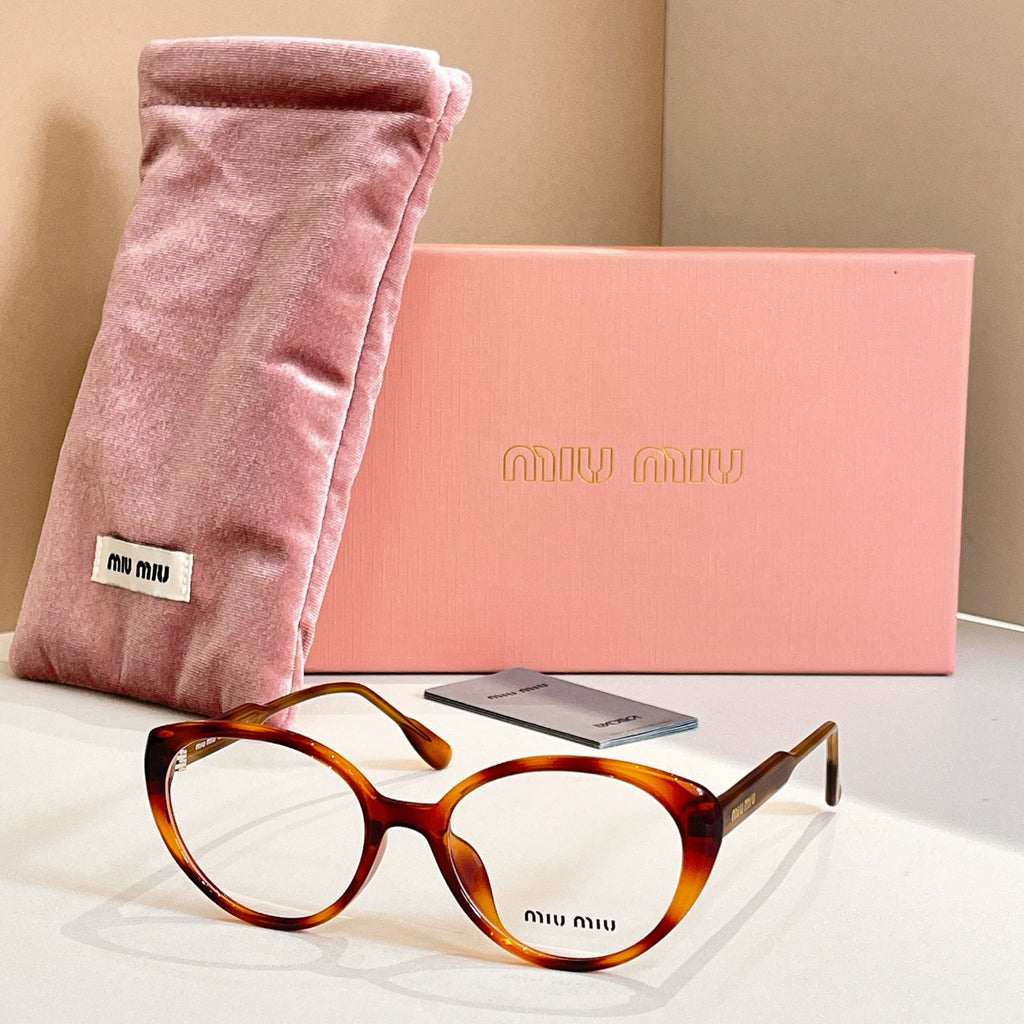 MiuMiu eyeglasses set of three: brown, black, and clear full-rim frames