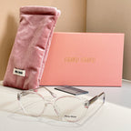 MiuMiu eyeglasses with clear full-rim frames and silver-toned temples