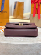 Louis Vuitton mini flap shoulder bag, dark plum, top flap with gold clasp.