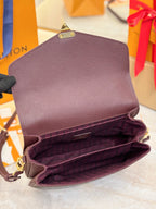 Louis Vuitton mini flap shoulder bag, dark plum, open interior with plaid lining.