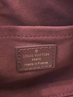 Louis Vuitton Paris made in France interior label on maroon leather bag