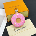 Louis Vuitton donut key pouch keychain in pink monogram pattern, silver hardware