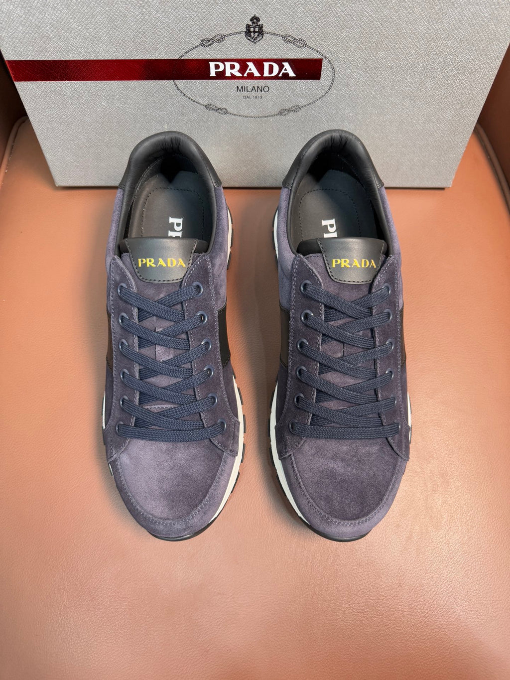 Prada unisex lace-up sneakers in dark blue suede with rubber sole