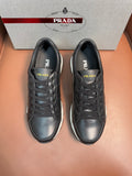 Prada unisex sneakers, dark leather upper with lace-up front and stitched toe detail