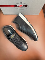 Prada unisex sneakers set with lace-up design, dark uppers and white rubber soles