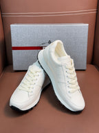 Prada unisex white sneakers with lace-up front and chunky sole