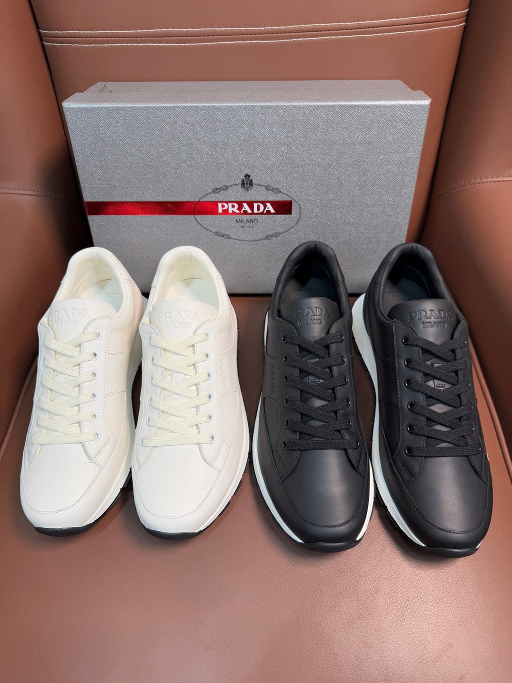 Prada unisex sneakers set: white and black lace-up with rubber soles
