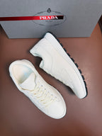 Prada unisex white sneakers, side and top view, lace-up