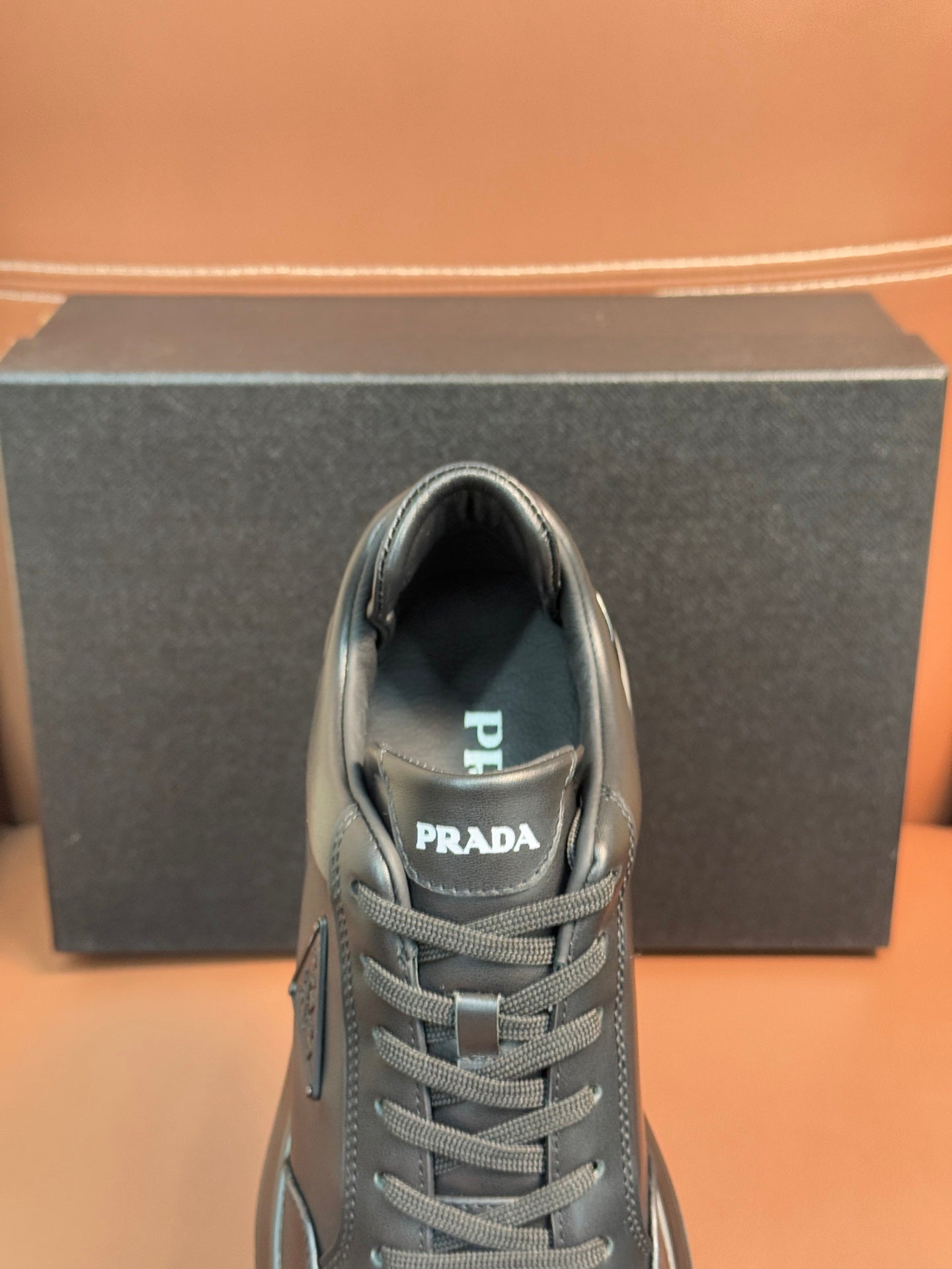 Prada dark sneakers, lace-up with branded tongue and interior lining