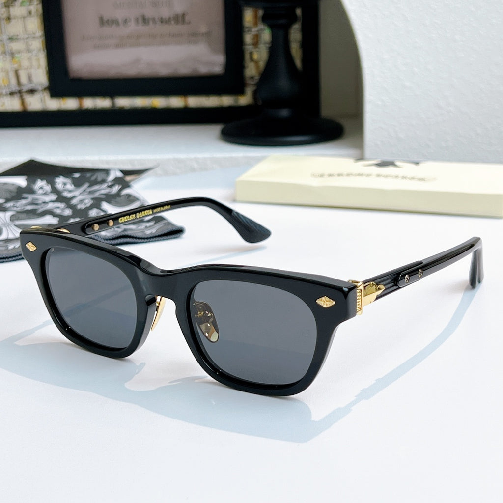Chrome glasses with black frame and dark lenses, front view