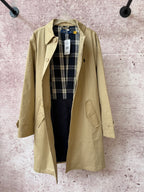 Tan long coat open view with plaid lining, notched lapels, and front button.