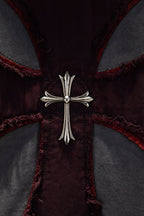 Embroidered cross pendant detail on maroon-and-gray hoodie front