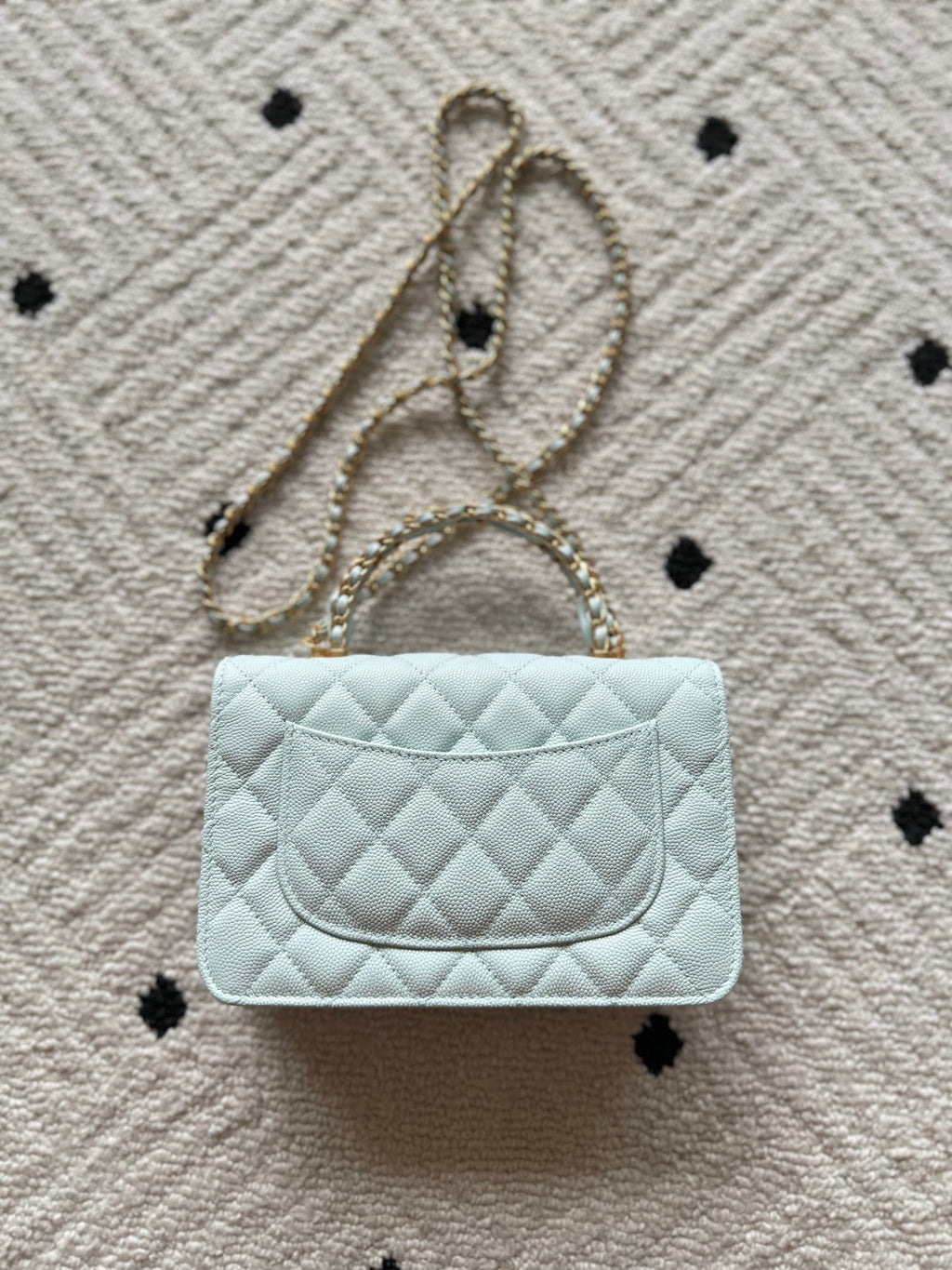 Chanel quilted mini bag, light blue, curved front flap with gold logo