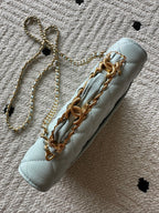 Chanel mini shoulder bag, light blue, gold chain strap with layered hardware
