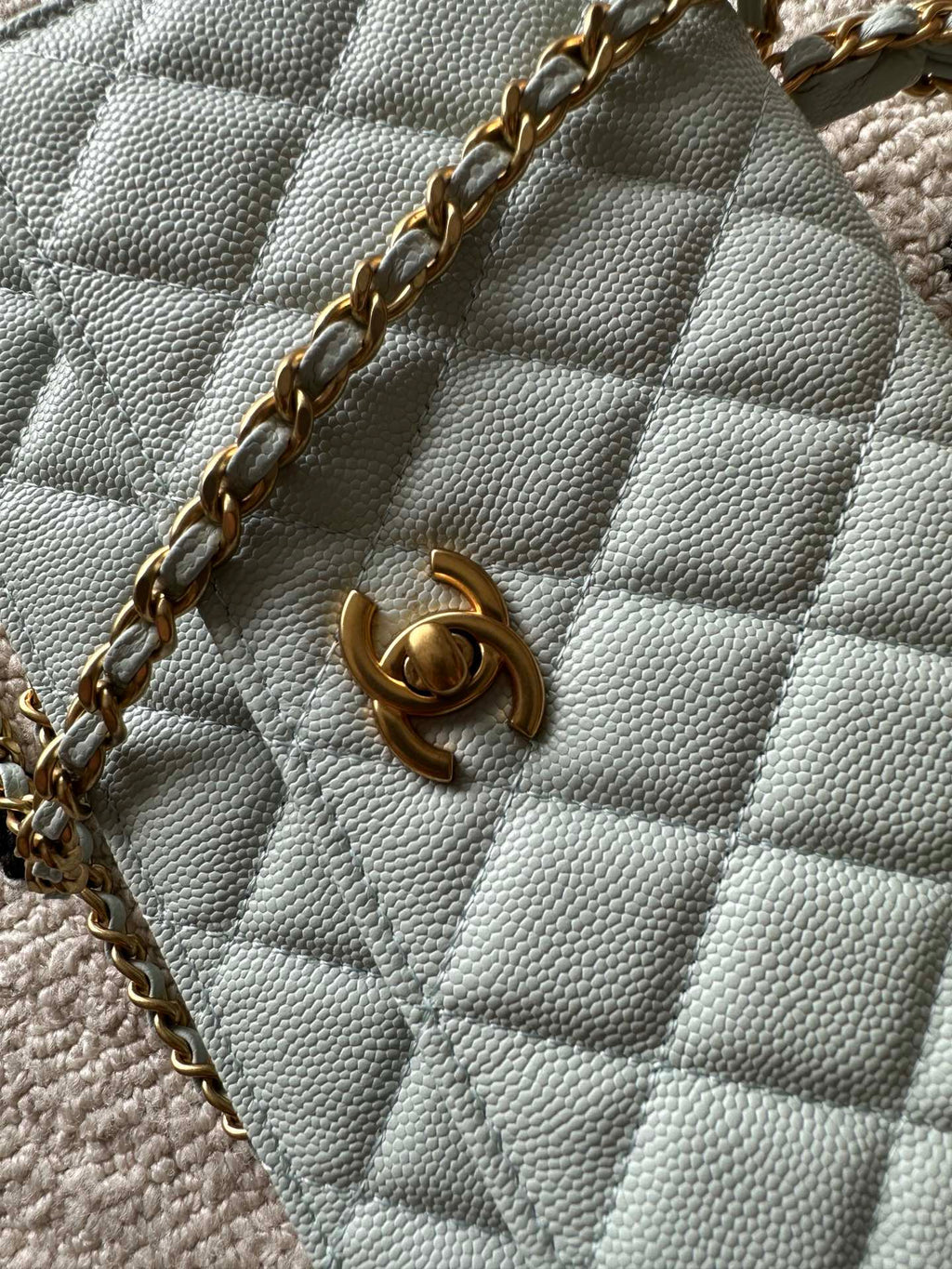 Chanel quilted mini flap bag, light blue, gold clasp and chain strap detail