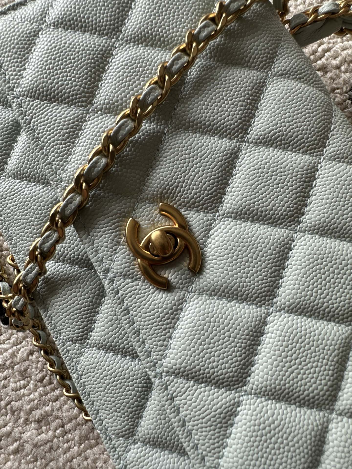 Chanel quilted mini flap bag, light blue, gold clasp and chain strap detail