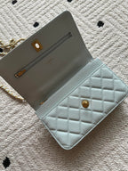 Chanel mini flap bag, light blue, open interior with card slot and lining
