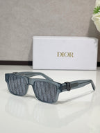 Dior sunglasses with dark blue frames and rectangular lenses