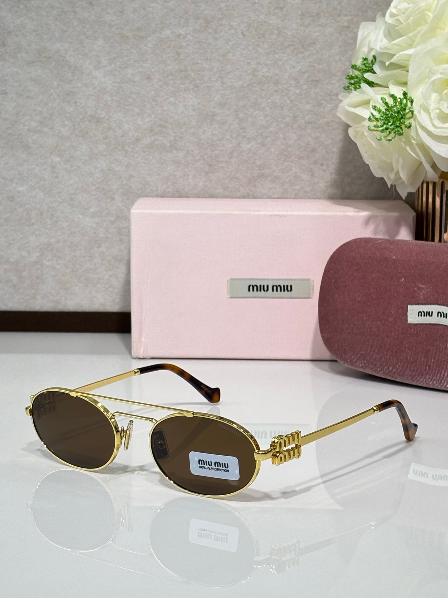 MiuMiu Glasses