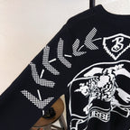 Black sweater with Burberry crest and horse graphic at side angle