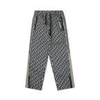Pants with all-over Dior monogram pattern, elastic waistband, and side stripes
