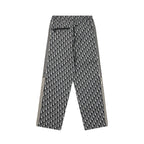 Pants with Dior monogram print and wide striped trim along the outer leg seams