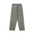 Dior monogram drawstring pants with elastic waistband and vertical side stripes