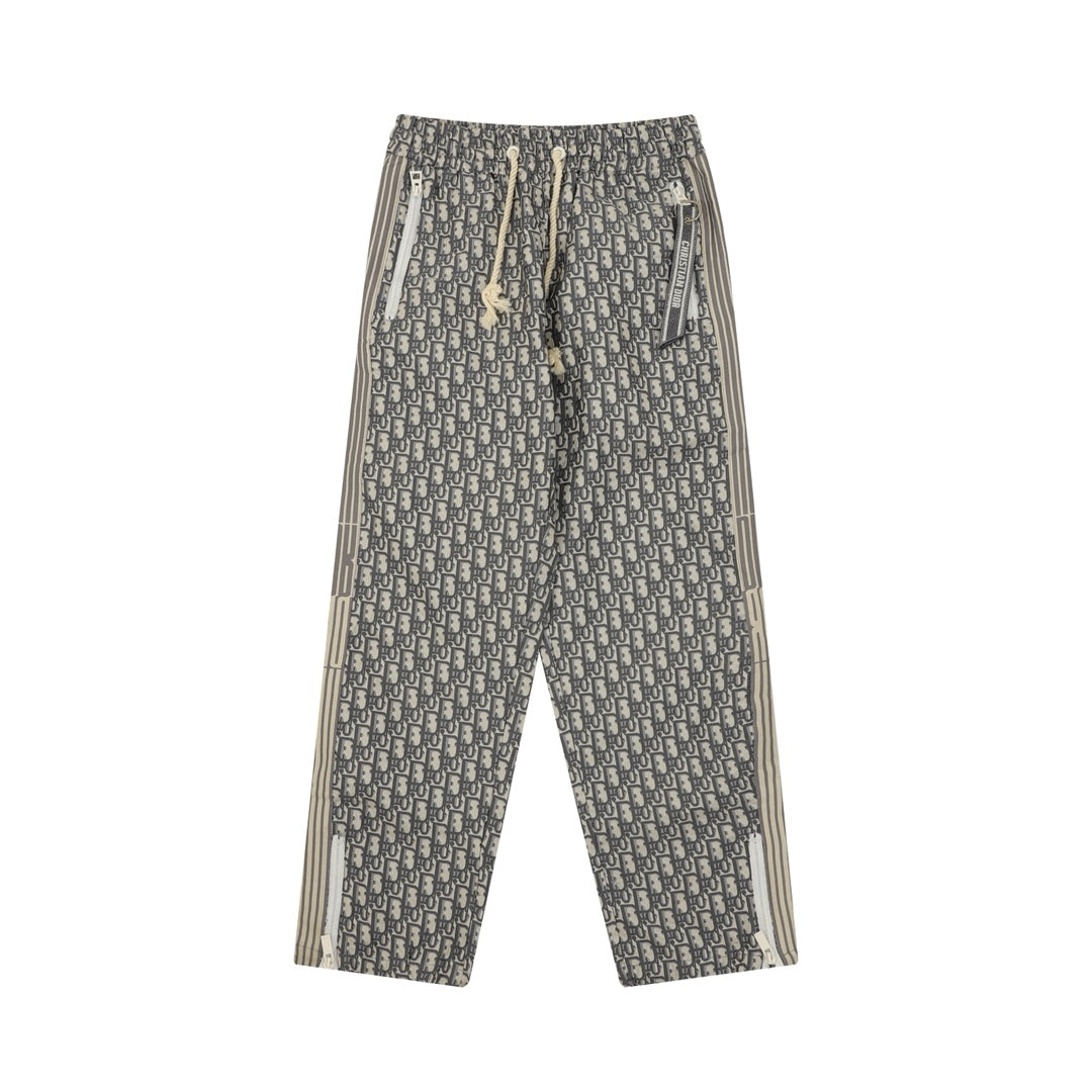 Dior monogram drawstring pants with striped side panels and elastic waistband