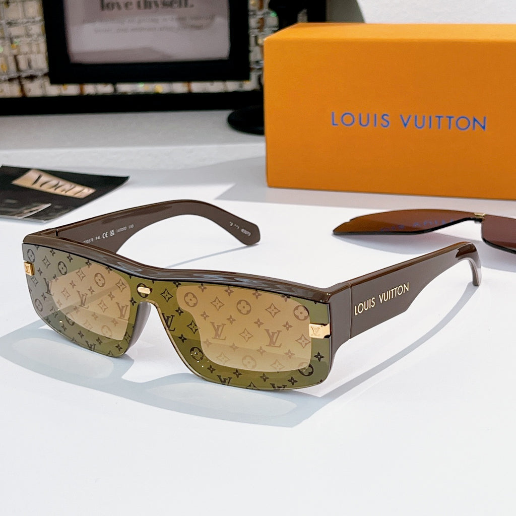 Louis Vuitton sunglasses with brown monogram frame and amber-tinted lenses