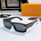 Louis Vuitton sunglasses with black monogram frame and dark smoke lenses