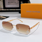 Louis Vuitton sunglasses with light brown-tinted lenses, gold frame and chain arms