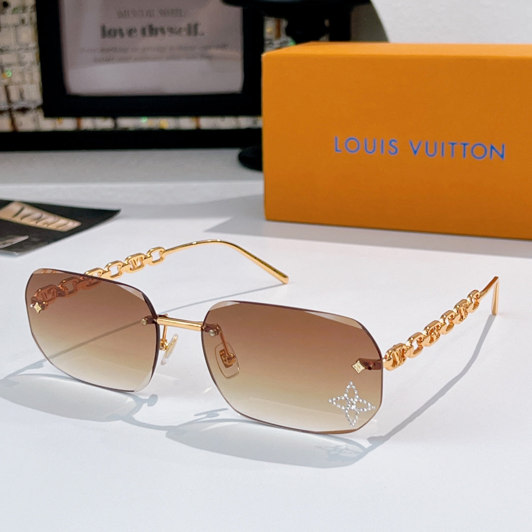 Louis Vuitton sunglasses with light brown-tinted lenses, gold frame and chain arms
