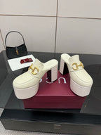 Gucci ladies off-white mule clogs with gold bit hardware and tall block heel platform