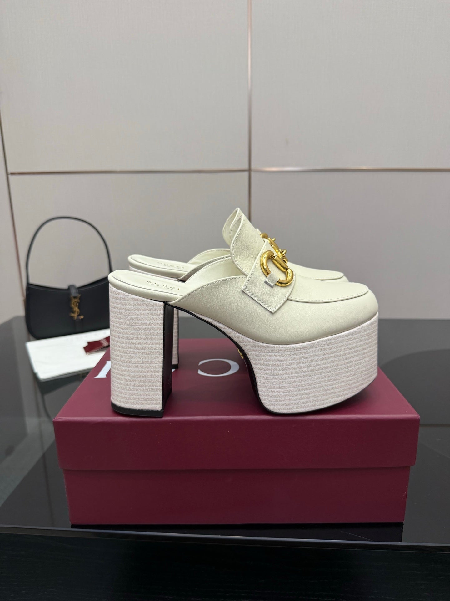 Gucci ladies off-white mule clog with gold logo hardware on chunky platform block heel