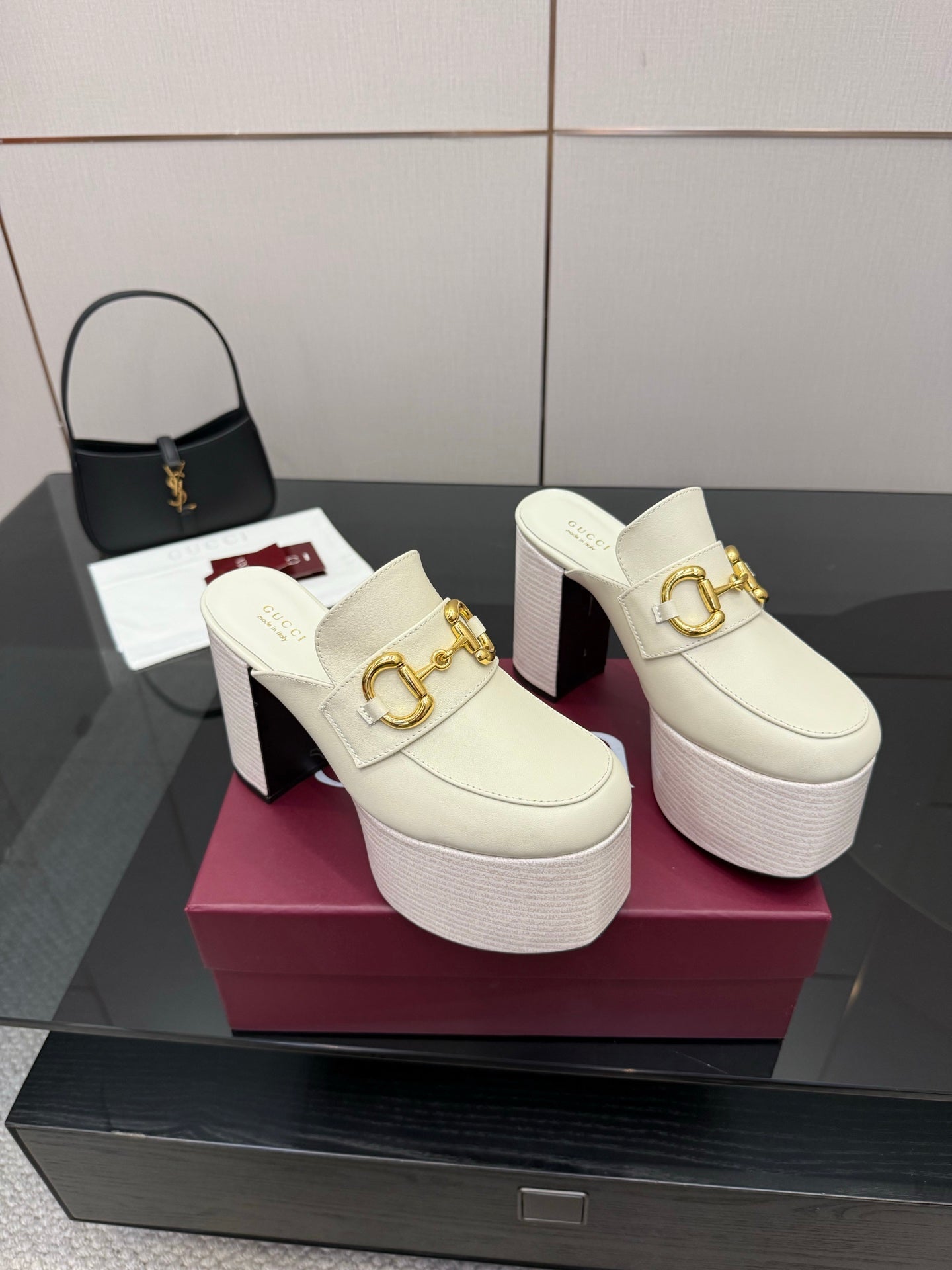 Pair of Gucci off-white platform mule clogs with gold logo buckle hardware and block heels