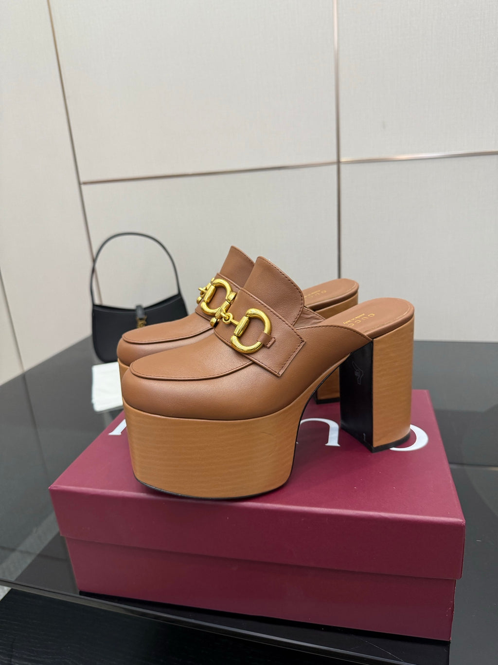 Gucci platform mules, tan leather with gold Horsebit buckle, side view