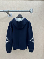 Navy back view hoodie with hood and long sleeves, graphic sleeve panels