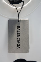 Balenciaga hang tag on white T-shirt collar