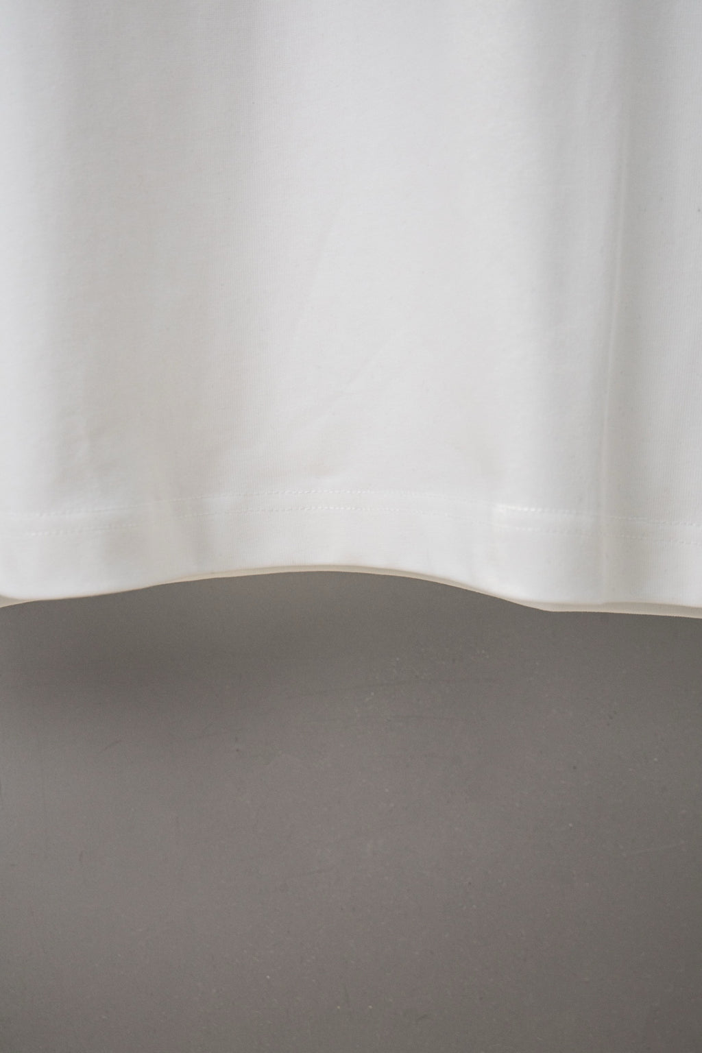 White Balenciaga long-sleeve T-shirt lower back with smooth fabric drape
