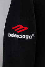 Black long-sleeve T-shirt with red Balenciaga logo on sleeve