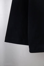 Black long-sleeve T-shirt with straight hem and subtle stitching